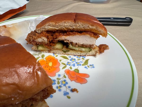 A cross-section of Popeyes' Pickle Glaze Sandwich.